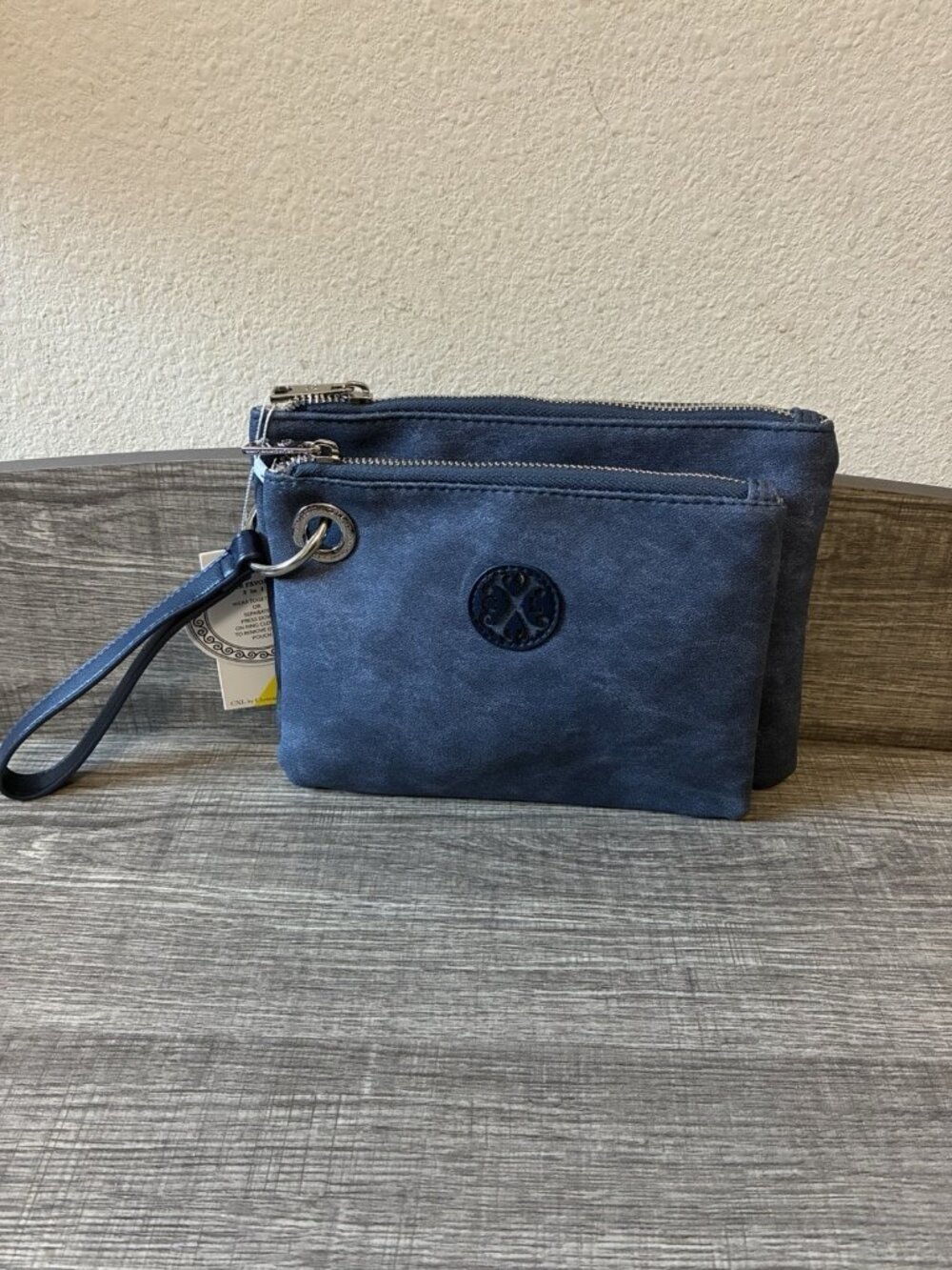 Christian Lacroix LUCA two Pouch Wristlet In The Color Indigo Denim